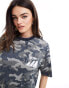 ASOS DESIGN oversized t-shirt with graphic in washed camo print