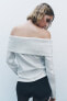 Metallic off-the-shoulder sweater