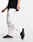 ASOS DESIGN baggy jeans with heavy rips in white