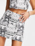 Noisy May mini skirt co-ord in newspaper print