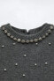 Knit sweater with rhinestones and faux pearls