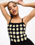 ASOS DESIGN crochet daisy playsuit in black