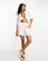 Фото #1 товара ASOS DESIGN crochet pull on short in white co-ord