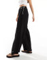 Bershka crinkle wide leg trousers in black Черный, S - EU 36 - фото #4