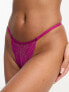 ASOS DESIGN Flutter lace cut-out thong in magenta