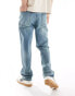 ASOS DESIGN straight leg jeans with stretch in mid wash blue