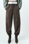 Nylon trousers with zips