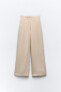 Loose fit pleated trousers