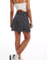 Фото #4 товара Miss Selfridge button through flippy mini skirt in black polka dot