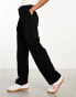 Monki tapered leg trousers with pleat front in black