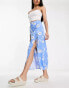 ASOS DESIGN bow detail midi skirt with thigh split in blue daisy print