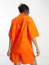 Public Desire x Paris Artiste shirt co-ord in bright orange
