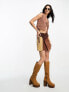 Фото #1 товара ASOS DESIGN festival suede patchwork western style mini skirt in brown