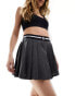 The Couture Club emblem pleated tennis mini skirt in charcoal