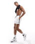 Nike Swimming Logo Tape 5 inch volley swim shorts in white