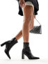 Mango heeled pointed boots in black