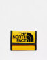 The North Face Base Camp wallet in yellow and black