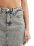 Calvin Klein Jeans front split denim maxi skirt in mid wash