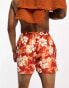 ASOS DESIGN swim shorts in short length in red floral print