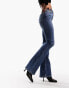 Фото #8 товара ASOS DESIGN Tall mid rise flare jeans in mid blue