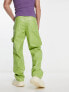 ASOS DESIGN baggy leather look trouser in green with carpenter detail