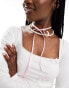 Pieces choker necklace with faux pearls and satin bow detail in pink