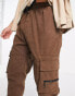 Bershka cuffed cargo trousers in brown exclusive at ASOS