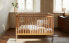 Engraved wooden cot