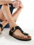 Фото #7 товара Birkenstock Gizeh big buckle sandals in black nubuck leather