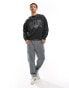 ASOS DESIGN oversized sweatshirt in washed charcoal with front text print