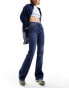 Фото #1 товара Tommy Jeans sylvia high waist flared jeans in mid wash