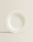 Earthenware soup plate with raised-design edge