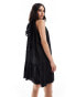 & Other Stories sleeveless mini dress with tiered hem and back bow tie in black