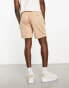 ASOS DESIGN slim shorts in beige quilted texture