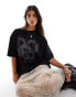 ASOS DESIGN boyfriend fit t-shirt with skull snake wings graphic in washed charcoal