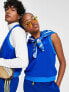 adidas Originals 'adicolor 70s' unisex cropped sweater vest in blue