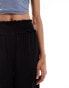 Фото #2 товара ASOS DESIGN Tall shirred waist cropped culotte trouser in black