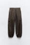 Nylon trousers with zips