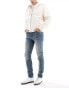 Фото #1 товара ASOS DESIGN skinny jeans in mid wash blue