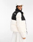 The North Face Saikuru puffer jacket in cream and black