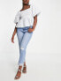 Фото #1 товара Urban Bliss slim jeans with busted knee in light wash