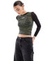 Фото #2 товара Karl Kani retro long sleeve top in black with green print and lace detail