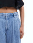 ASOS DESIGN wide leg pleated jeans in vintage wash