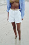 DARTED BERMUDA SHORTS WITH BELT