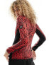 Фото #7 товара Dare 2b Outlast Core stretch mid layer half zip sweat in red leopard print