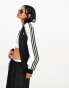 adidas Originals Superstar trackjacket in black and white