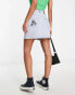 Фото #1 товара Karl Kani OG denim skirt in light blue with floral embroidery