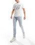 Фото #1 товара Levi's 512 slim taper jeans in light blue wash