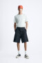 TOPSTITCHED DENIM BERMUDA SHORTS