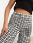 Noisy May flared trousers in black houndstooth